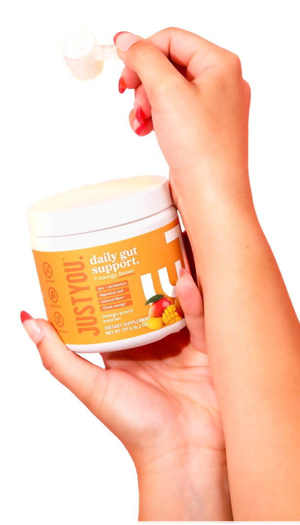 Customer holding JustYou scoop and jar